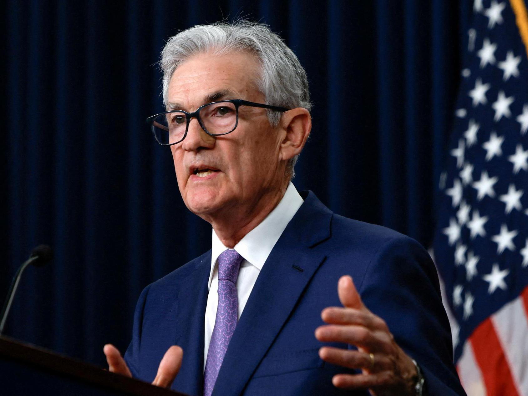 Fed Holds Rates Steady, Delays Potential Cut Amid Economic Uncertainties